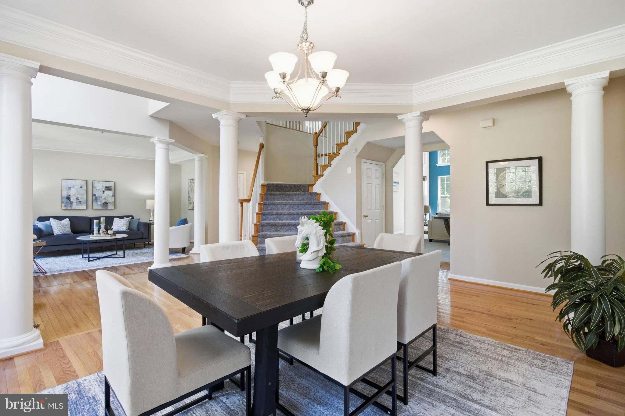 9013 Helmsley Drive Clinton, MD 20735 - Photo 21 of 68 a view of a dining room with furniture and wooden floor