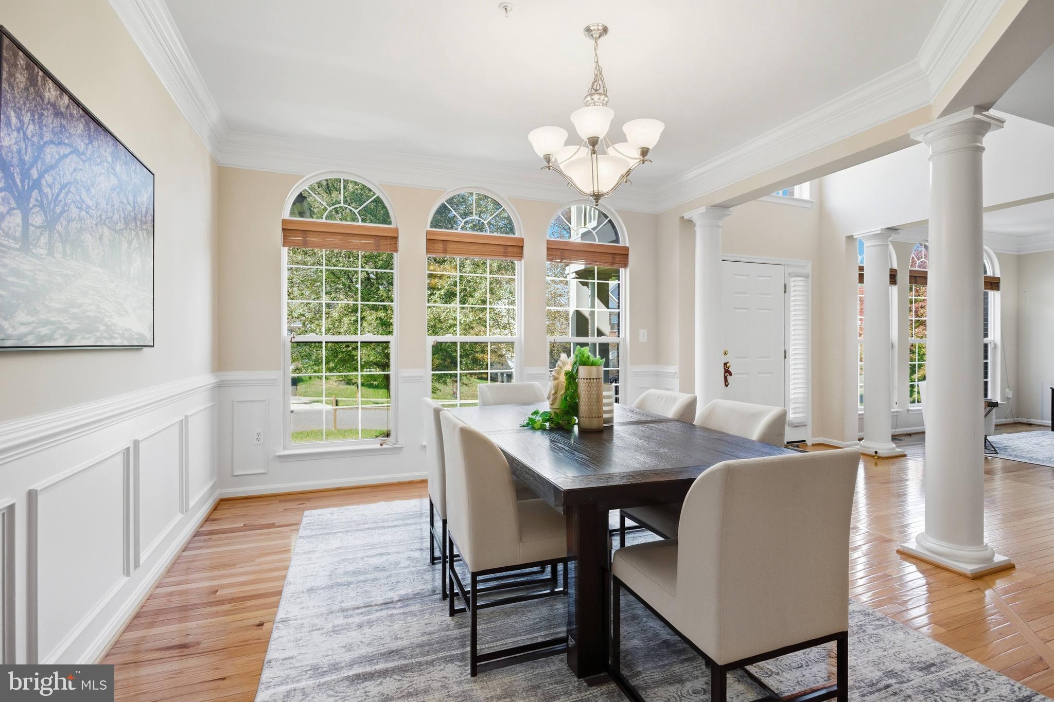 9013 Helmsley Drive Clinton, MD 20735 - Photo 22 of 68 a view of a dining room with furniture window and wooden floor