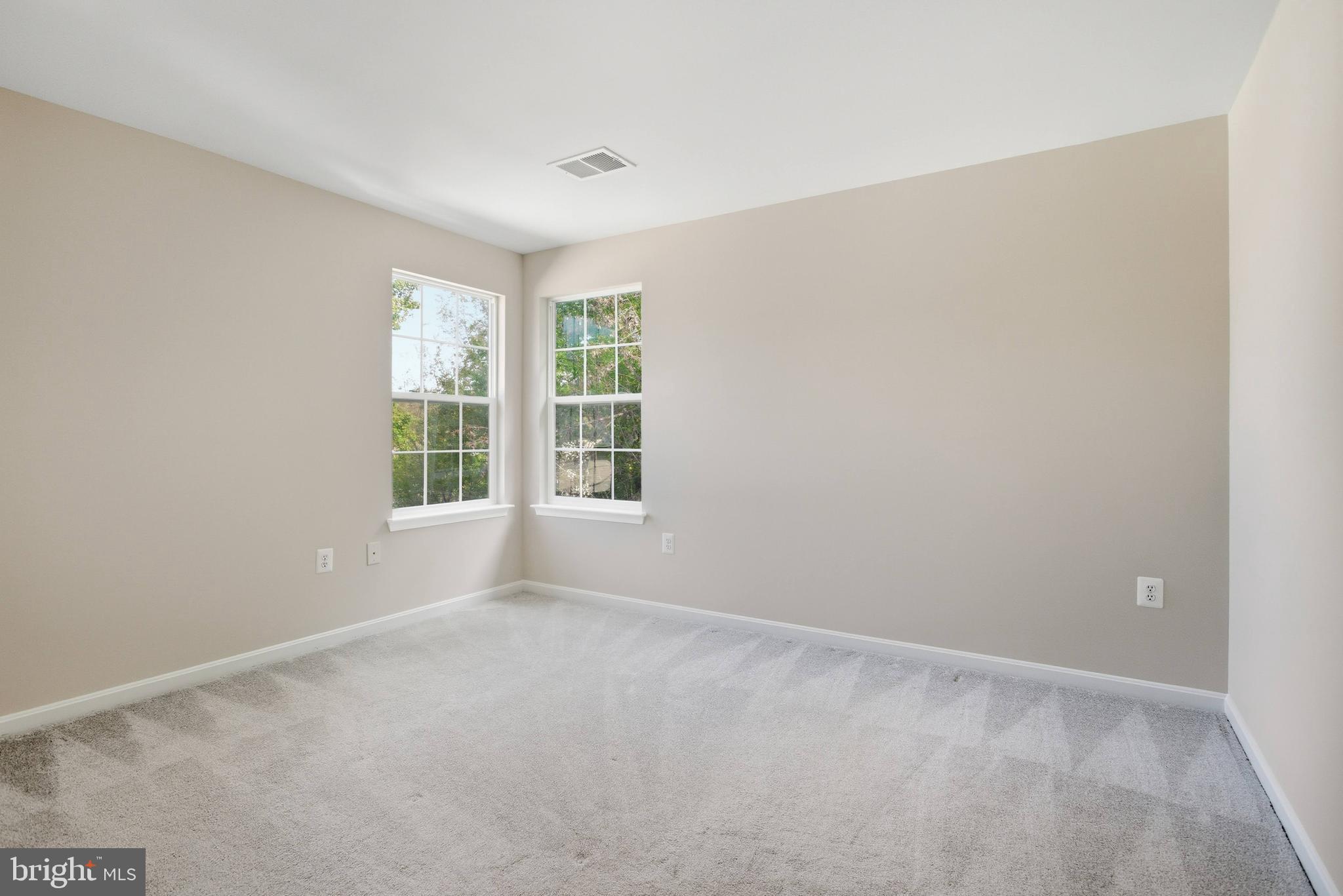 9013 Helmsley Drive Clinton, MD 20735 - Photo 33 of 68 an empty room with windows