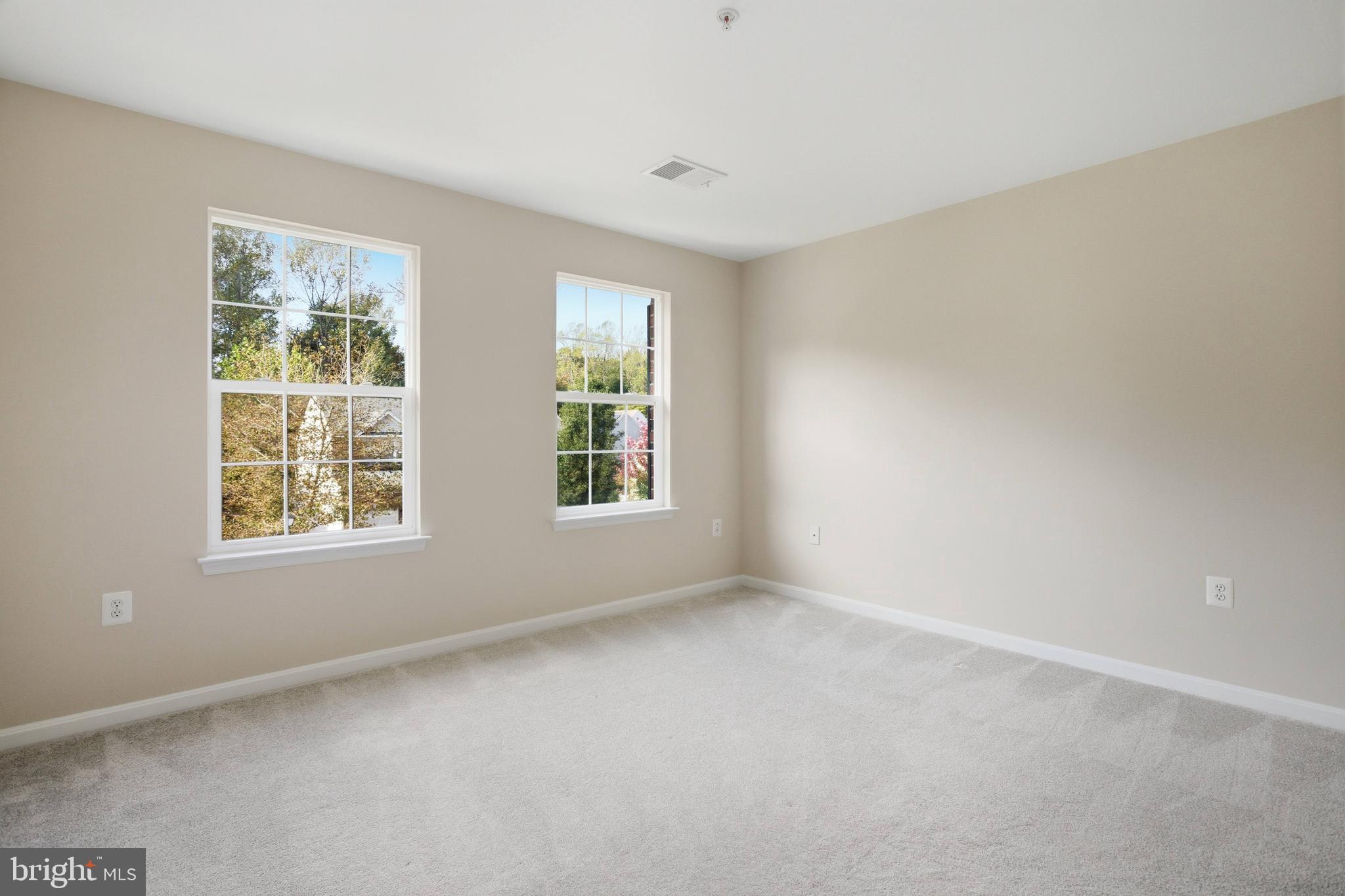 9013 Helmsley Drive Clinton, MD 20735 - Photo 37 of 68 an empty room with windows