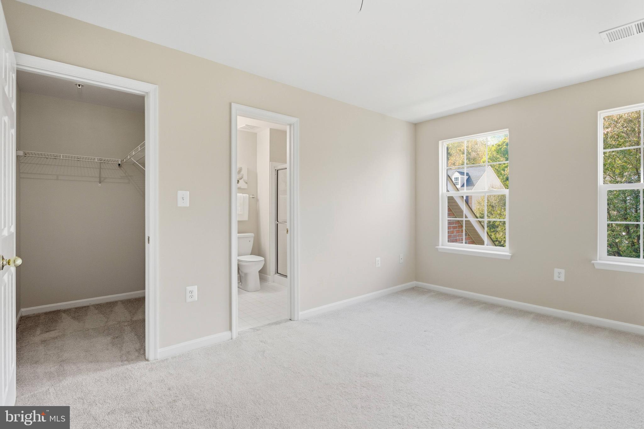 9013 Helmsley Drive Clinton, MD 20735 - Photo 38 of 68 an empty room with windows and closet