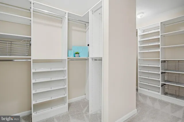 a view of a room with racks on the wall