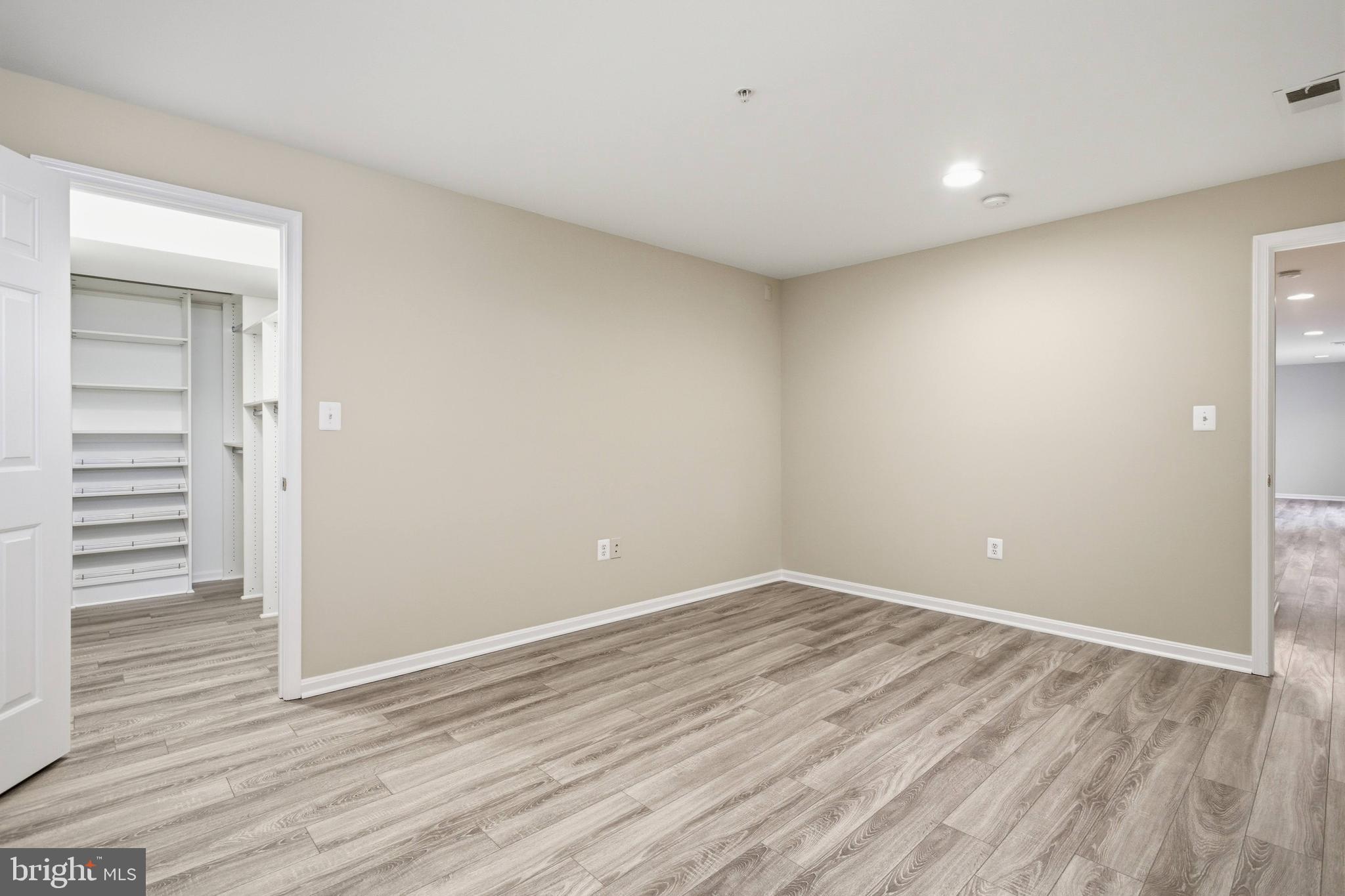 9013 Helmsley Drive Clinton, MD 20735 - Photo 50 of 68 a view of room with wooden floor