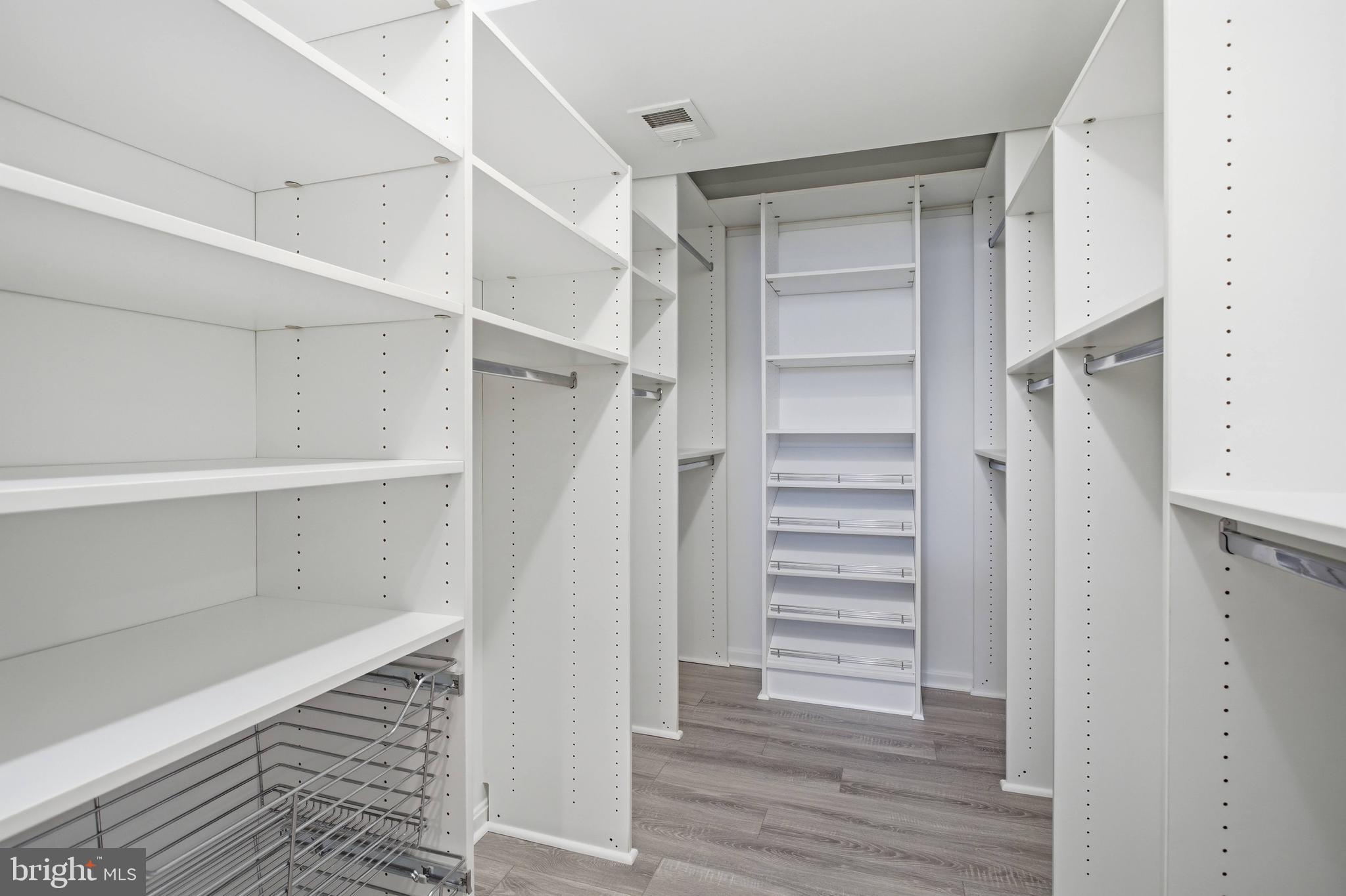 9013 Helmsley Drive Clinton, MD 20735 - Photo 52 of 68 a view of walk in closet with empty racks