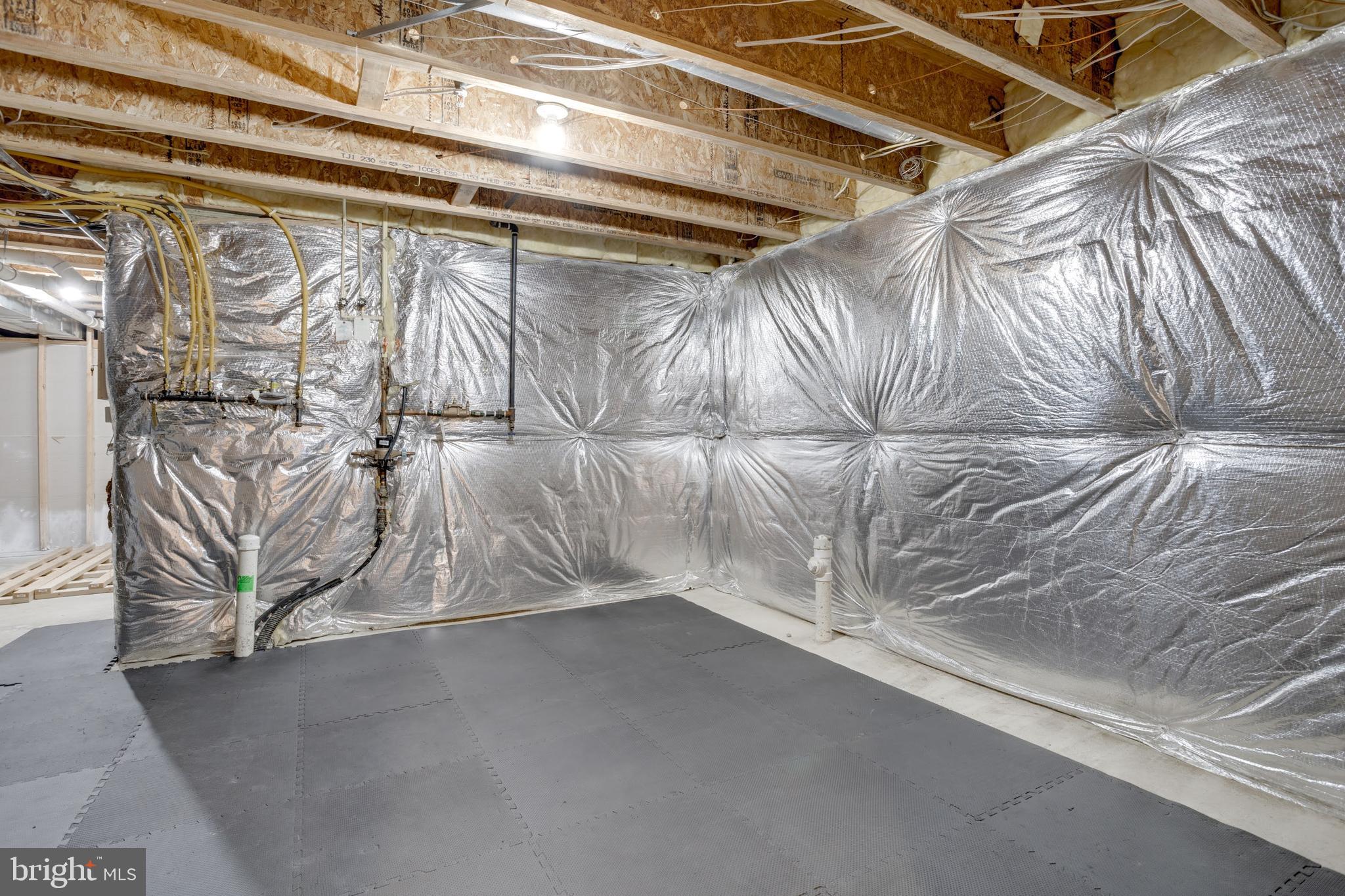 9013 Helmsley Drive Clinton, MD 20735 - Photo 63 of 68 a view of a room with racks on the wall