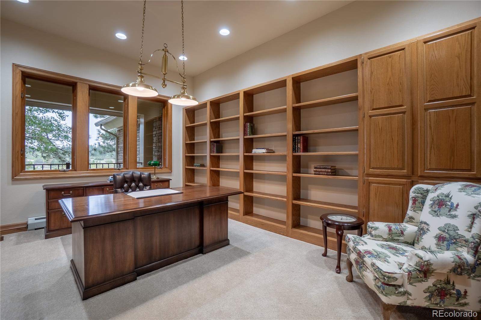 3282 Tomah Road Larkspur, CO 80118 - Photo 13 of 35 a view of a livingroom with furniture and window