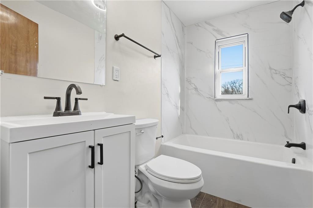 1865 Montour St Extension Coraopolis, PA 15108 - Photo 16 of 41 a bathroom with a sink toilet and bathtub