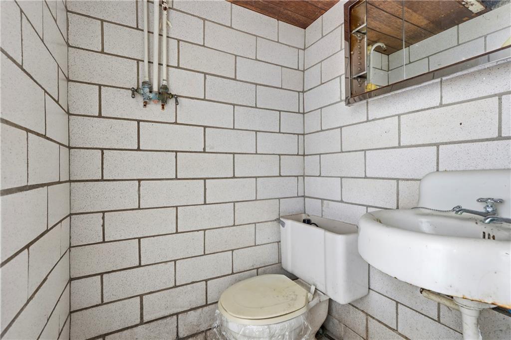 1865 Montour St Extension Coraopolis, PA 15108 - Photo 27 of 41 a bathroom with a sink and toilet