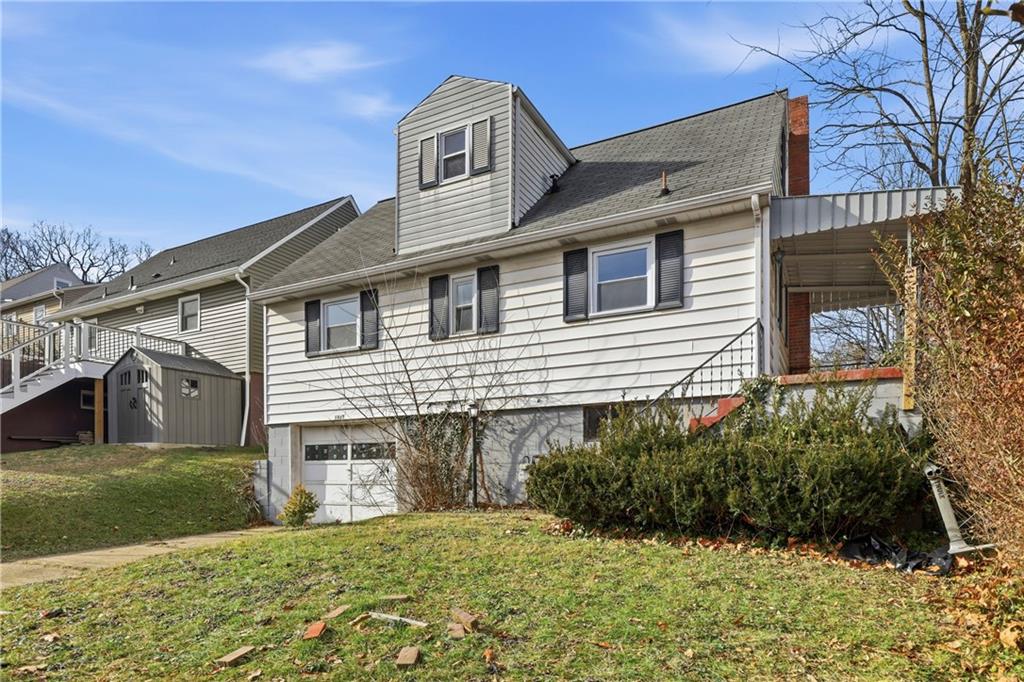 1865 Montour St Extension Coraopolis, PA 15108 - Photo 34 of 41 a front view of a house with a yard