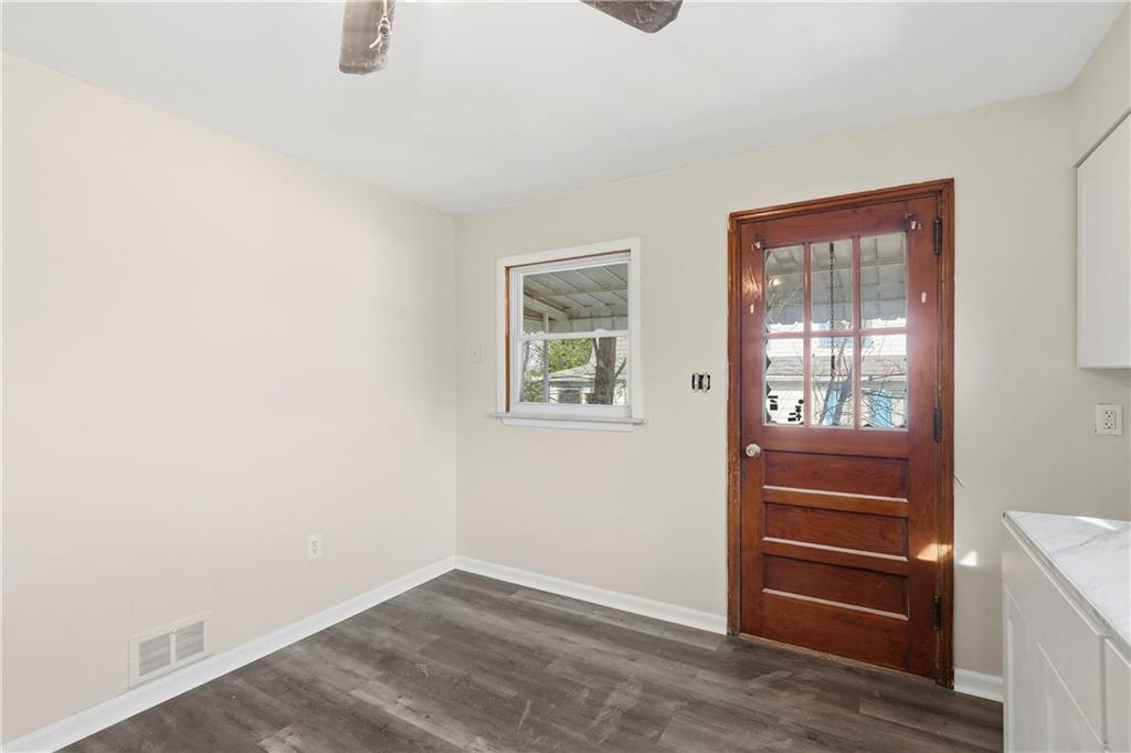 1865 Montour St Extension Coraopolis, PA 15108 - Photo 5 of 41 an empty room with a hardwood and a window