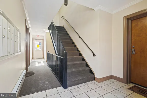 a view of an entryway with staircase