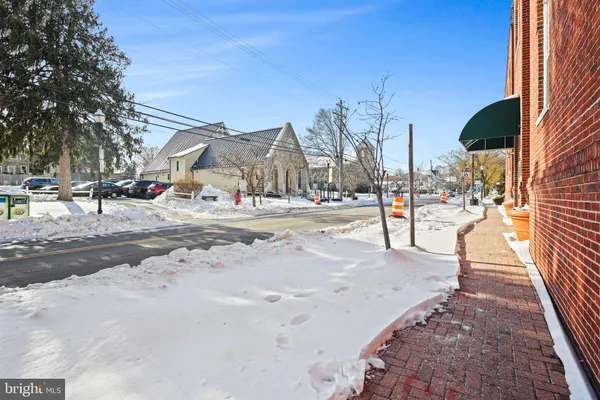 a view of a street with houses