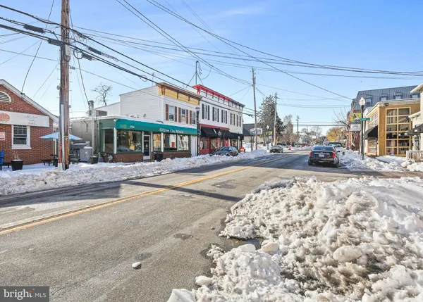 a city street lined with tall buildings