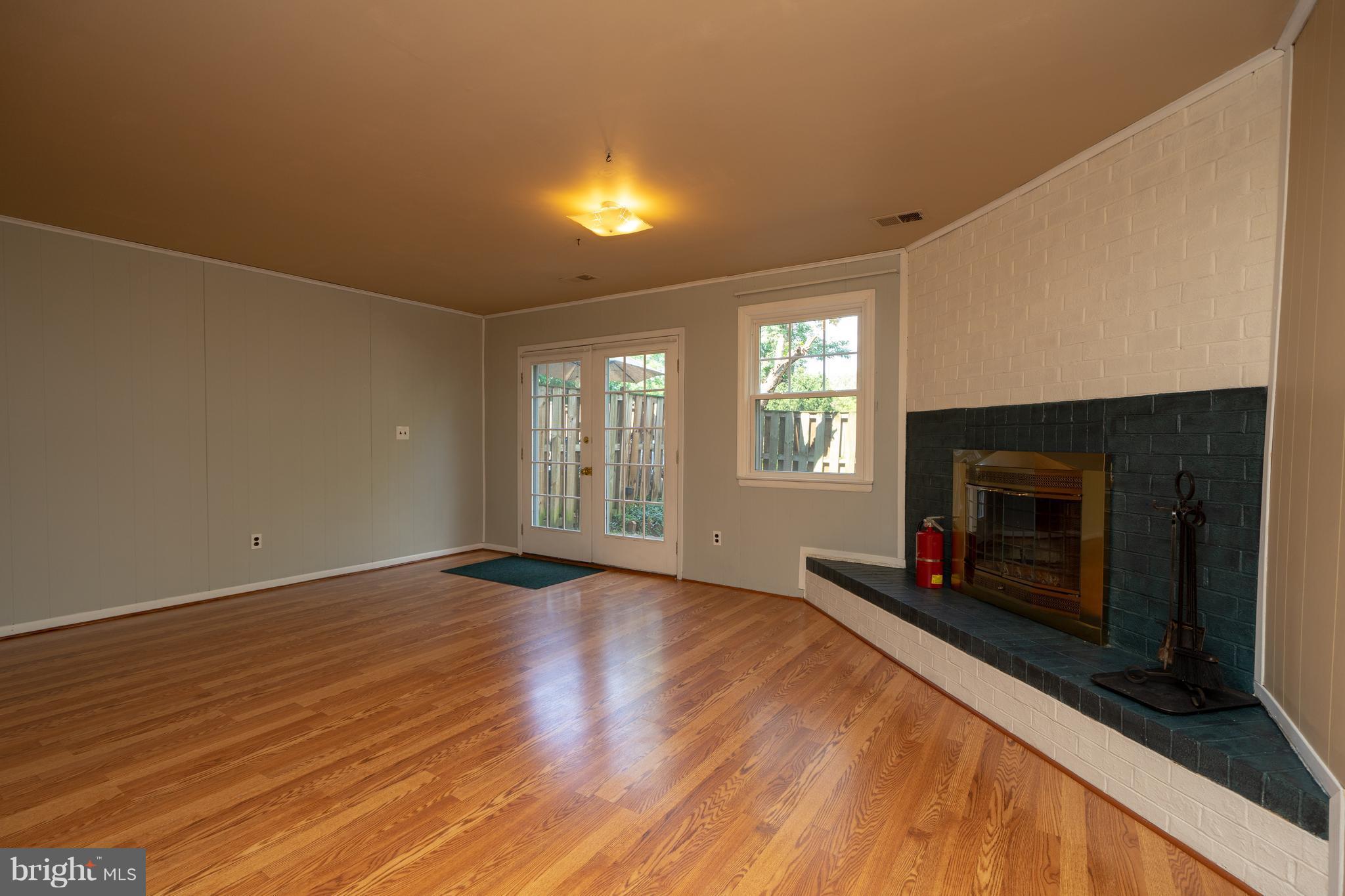 3857 Chain Bridge Road Fairfax, VA 22030 - Photo 22 of 30 Family Room in basement with fireplace