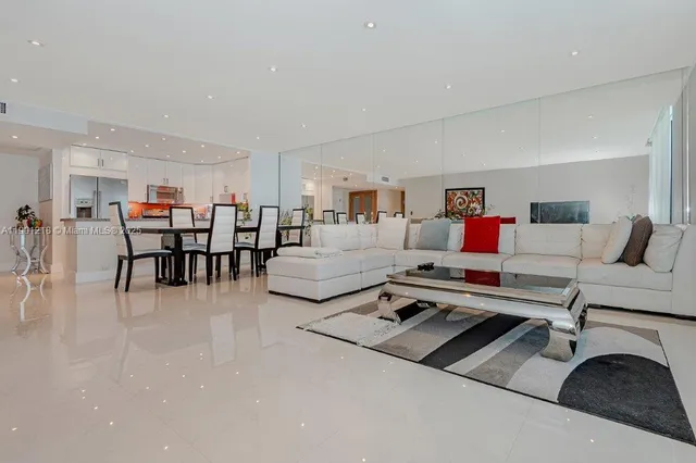 a living room with furniture and a table