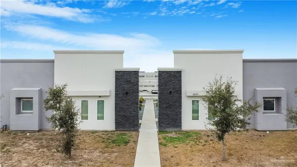 a front view of house with yard