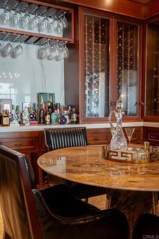 a view of kitchen with dining table and chairs