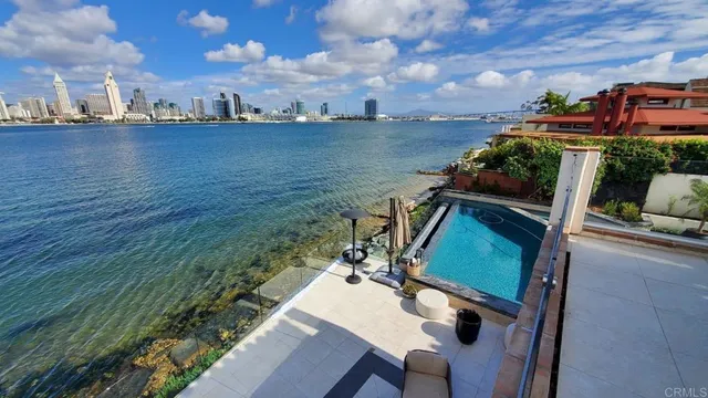 a view of a chair and table in the terrace