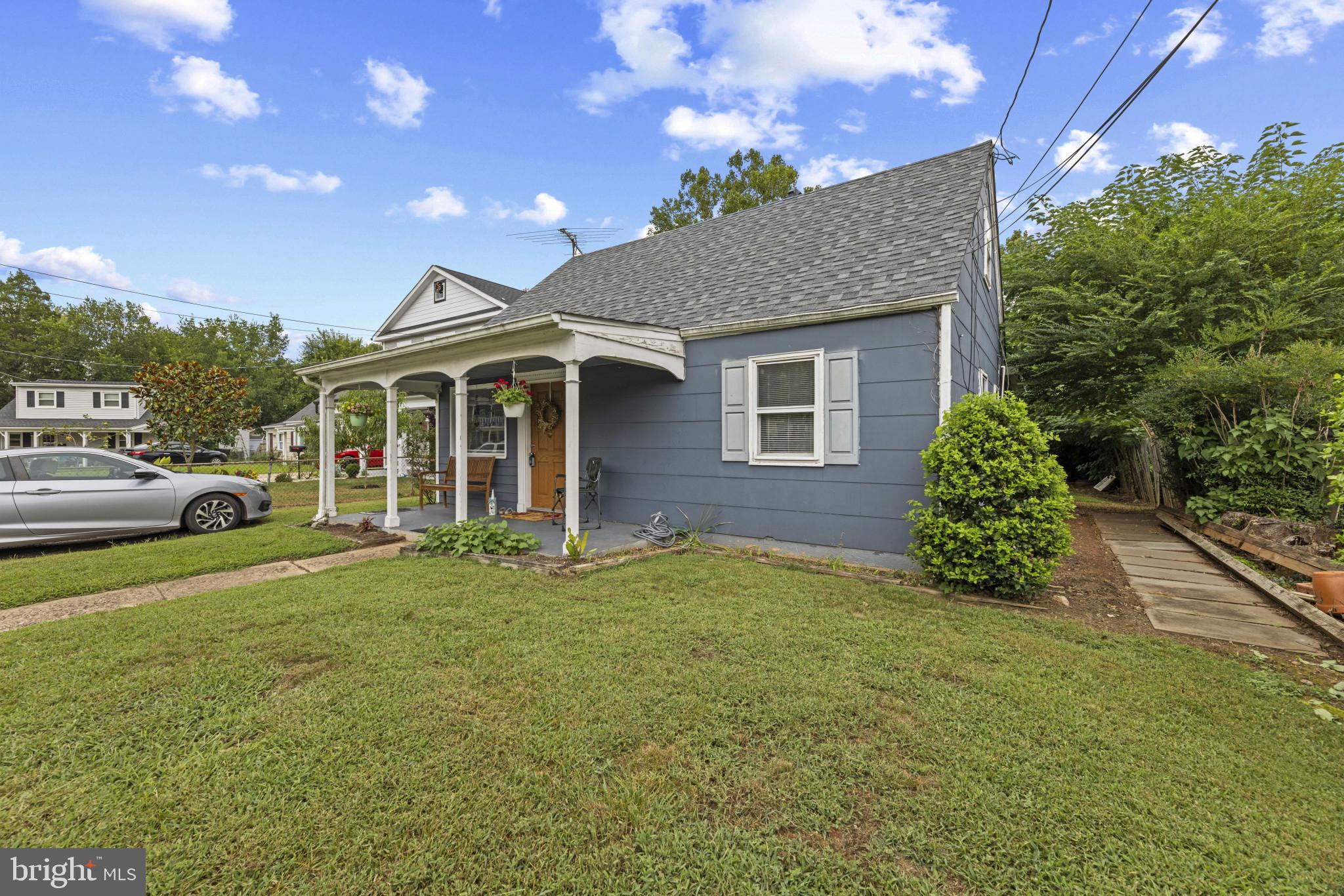 118 Mace Street Manassas Park, VA 20111 - Photo 2 of 25 a front view of a house with a yard