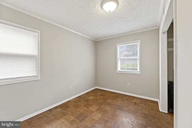 an empty room with windows