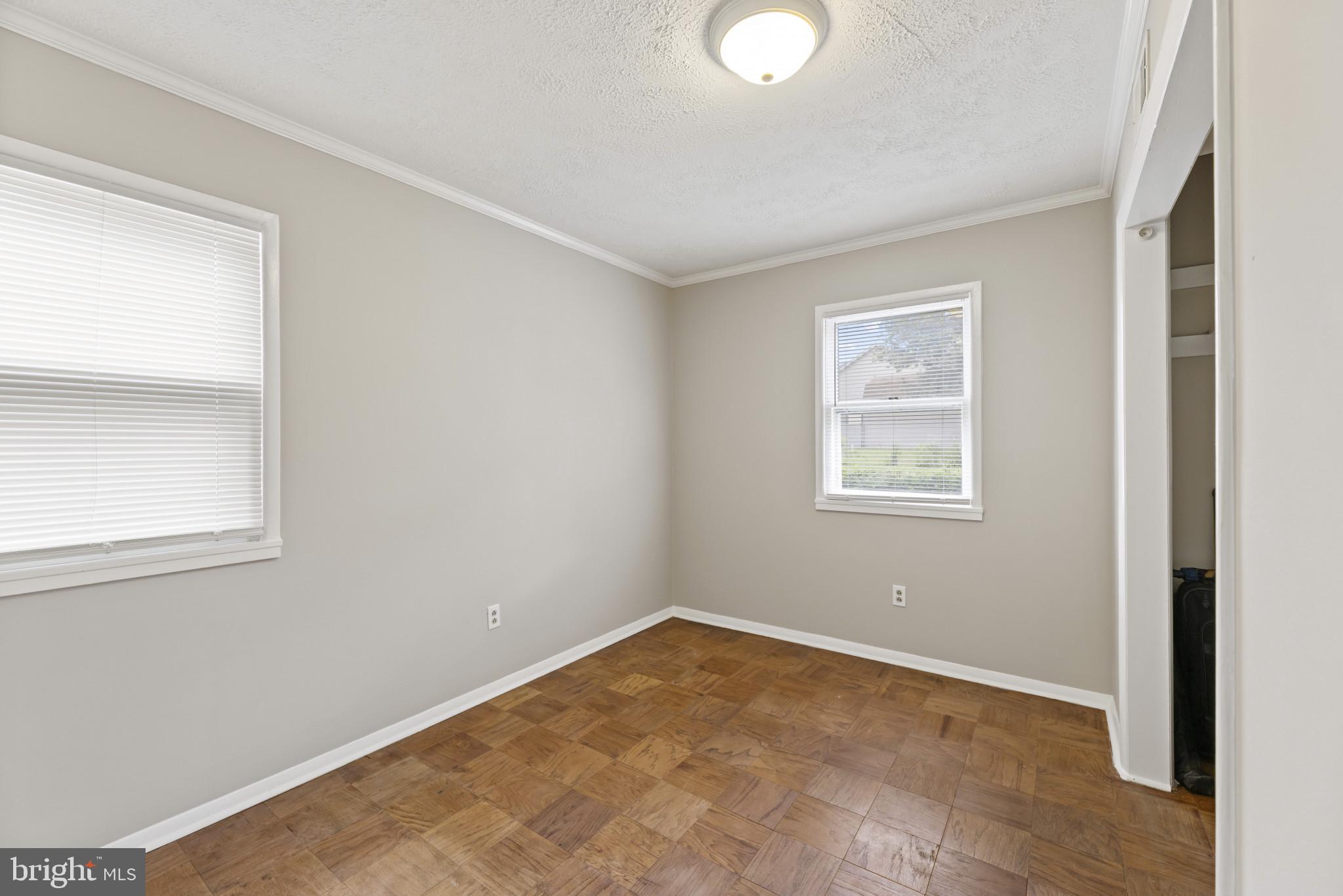118 Mace Street Manassas Park, VA 20111 - Photo 6 of 25 an empty room with windows