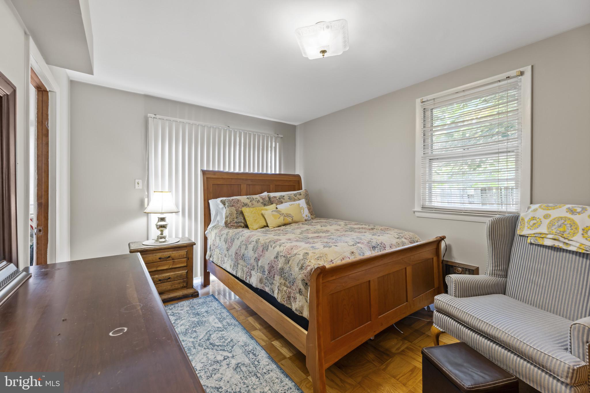 118 Mace Street Manassas Park, VA 20111 - Photo 9 of 25 a bedroom with a bed and window
