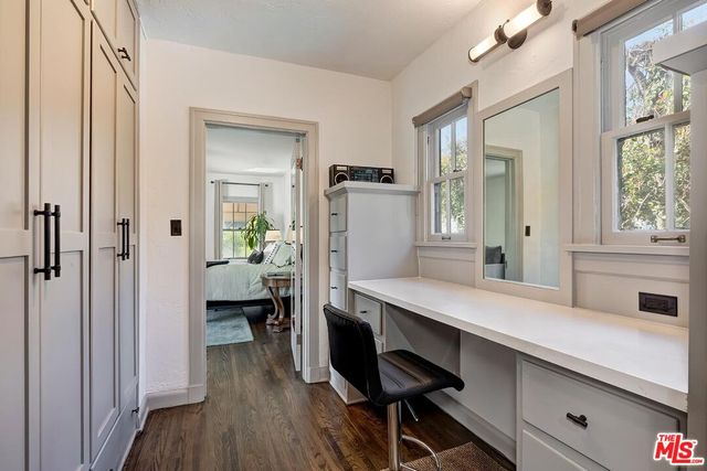 a kitchen with a table and chairs in it