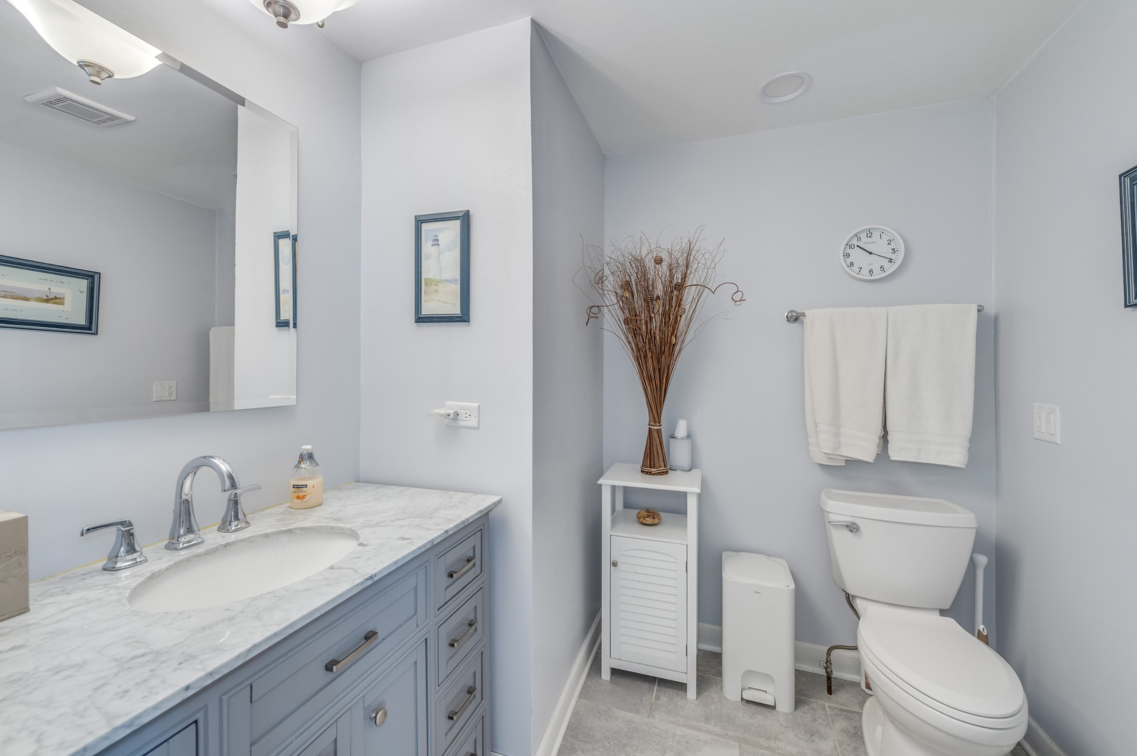 1716 Beech Road Mount Prospect, IL 60056 - Photo 13 of 28 a bathroom with a granite countertop toilet sink and mirror