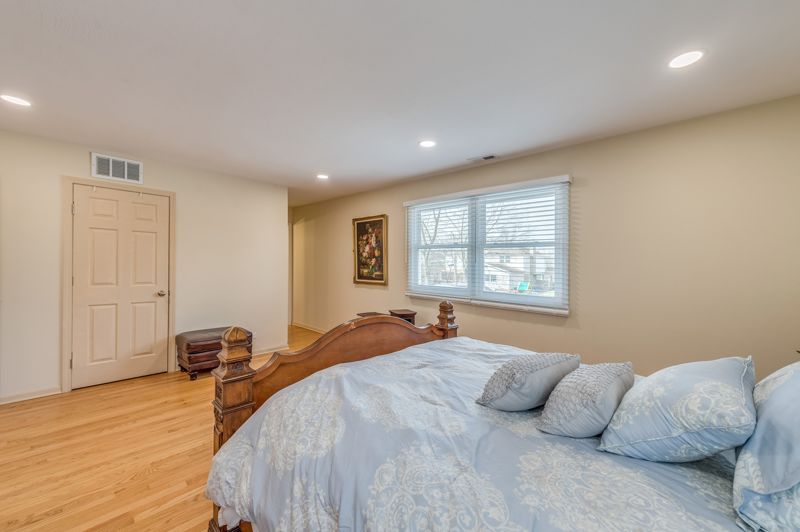1716 Beech Road Mount Prospect, IL 60056 - Photo 15 of 28 a bedroom with a bed and wooden floor
