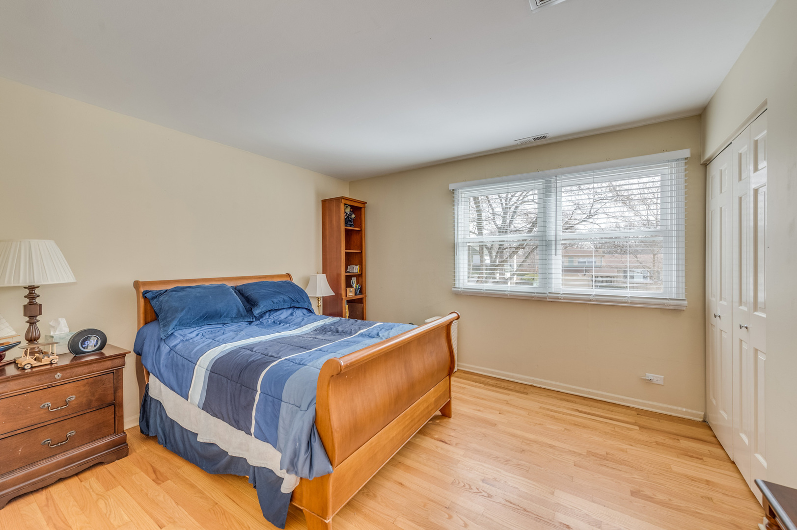 1716 Beech Road Mount Prospect, IL 60056 - Photo 18 of 28 a bedroom with a bed and a window