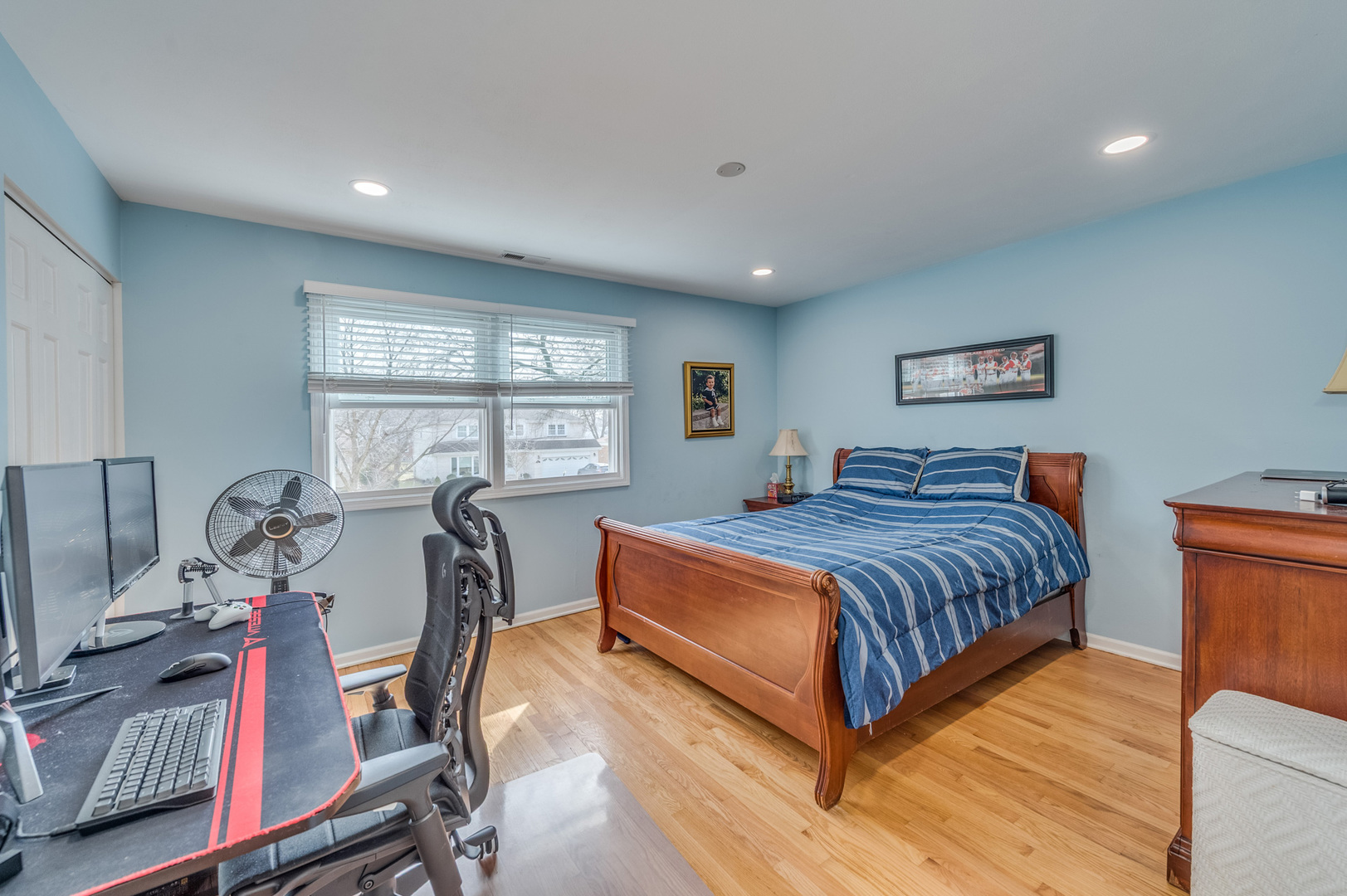 1716 Beech Road Mount Prospect, IL 60056 - Photo 20 of 28 a bedroom with a bed and wooden floor