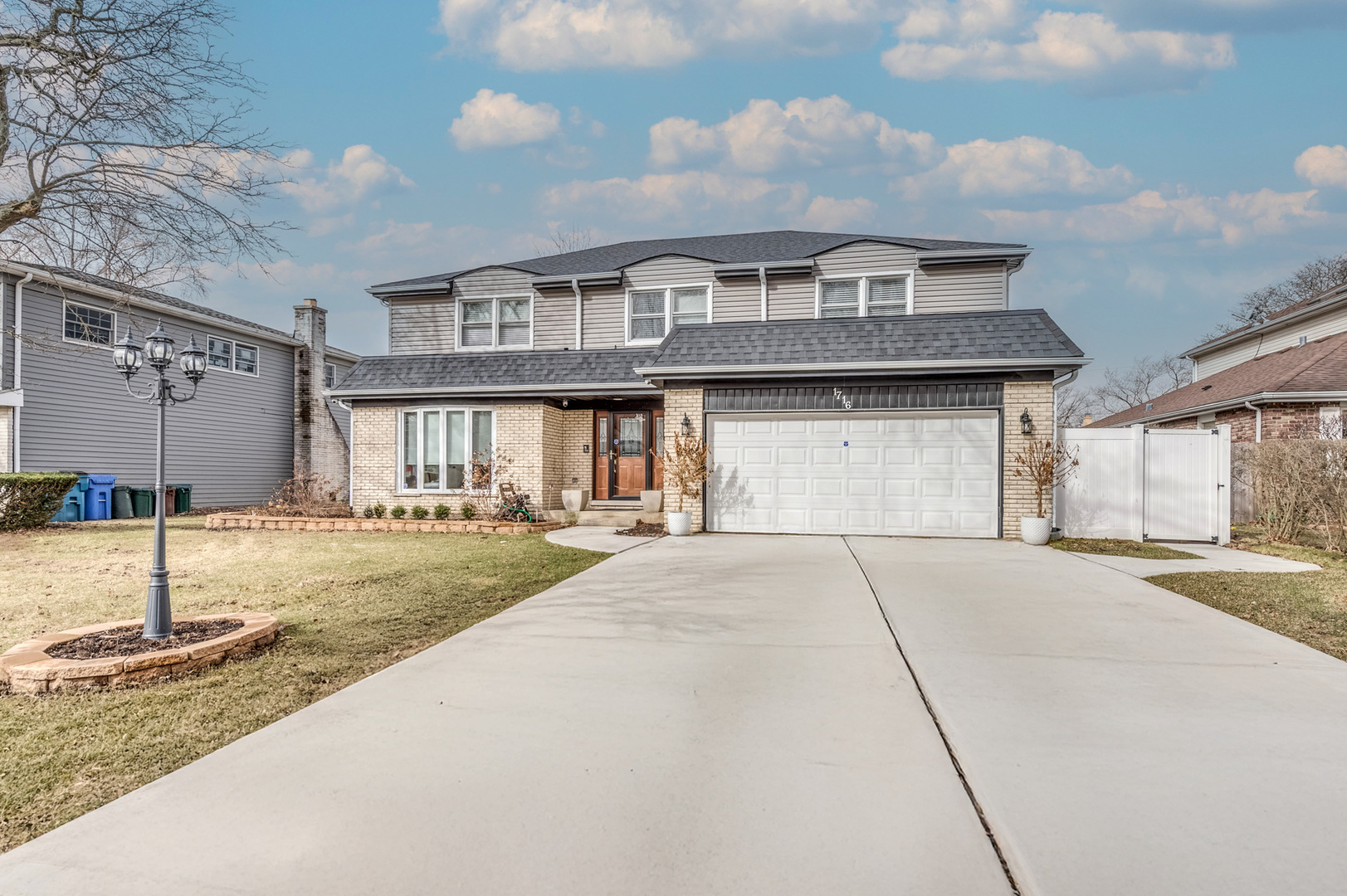 1716 Beech Road Mount Prospect, IL 60056 - Photo 2 of 28 a house view with a garden space