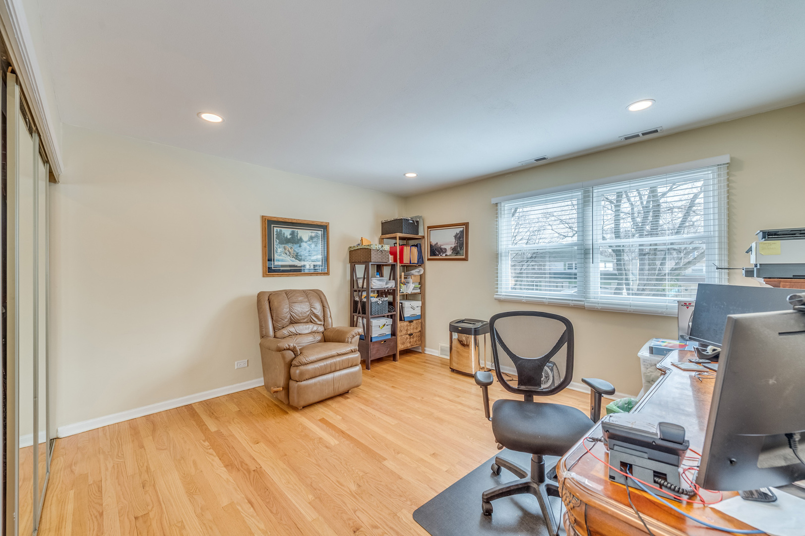 1716 Beech Road Mount Prospect, IL 60056 - Photo 22 of 28 a view of a workspace with furniture and a window