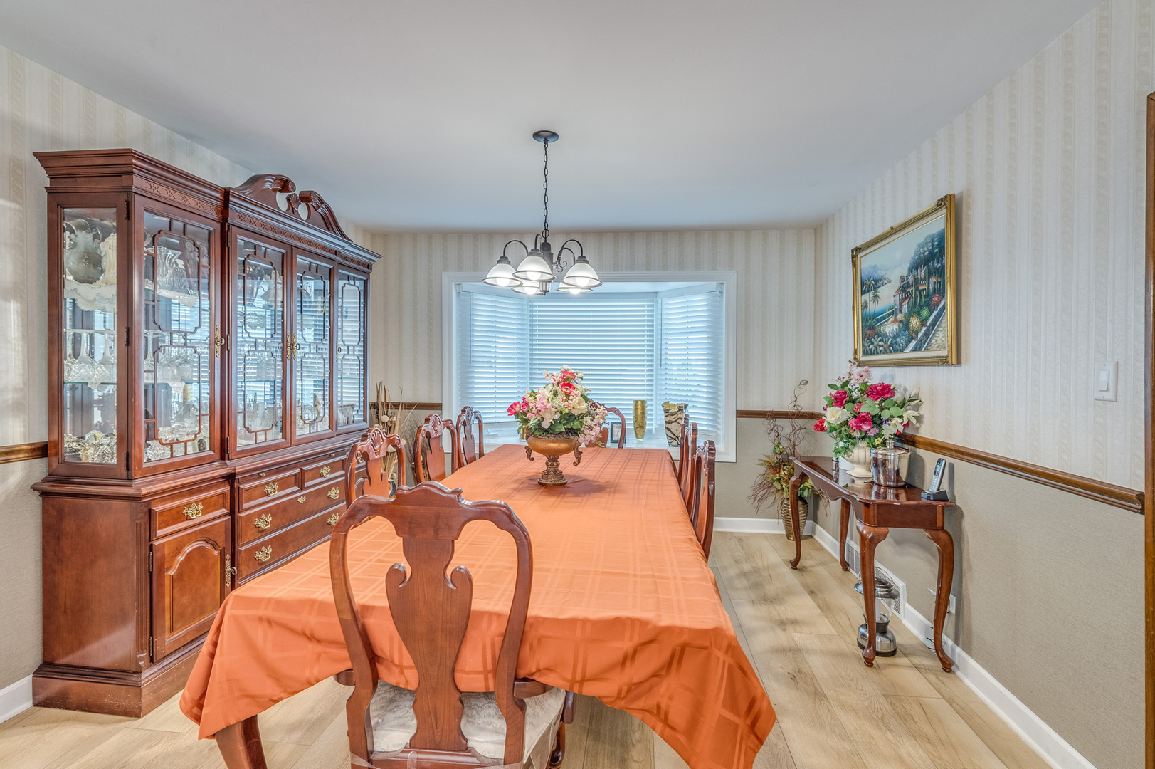 1716 Beech Road Mount Prospect, IL 60056 - Photo 6 of 28 a view of a dining room with furniture window and wooden floor