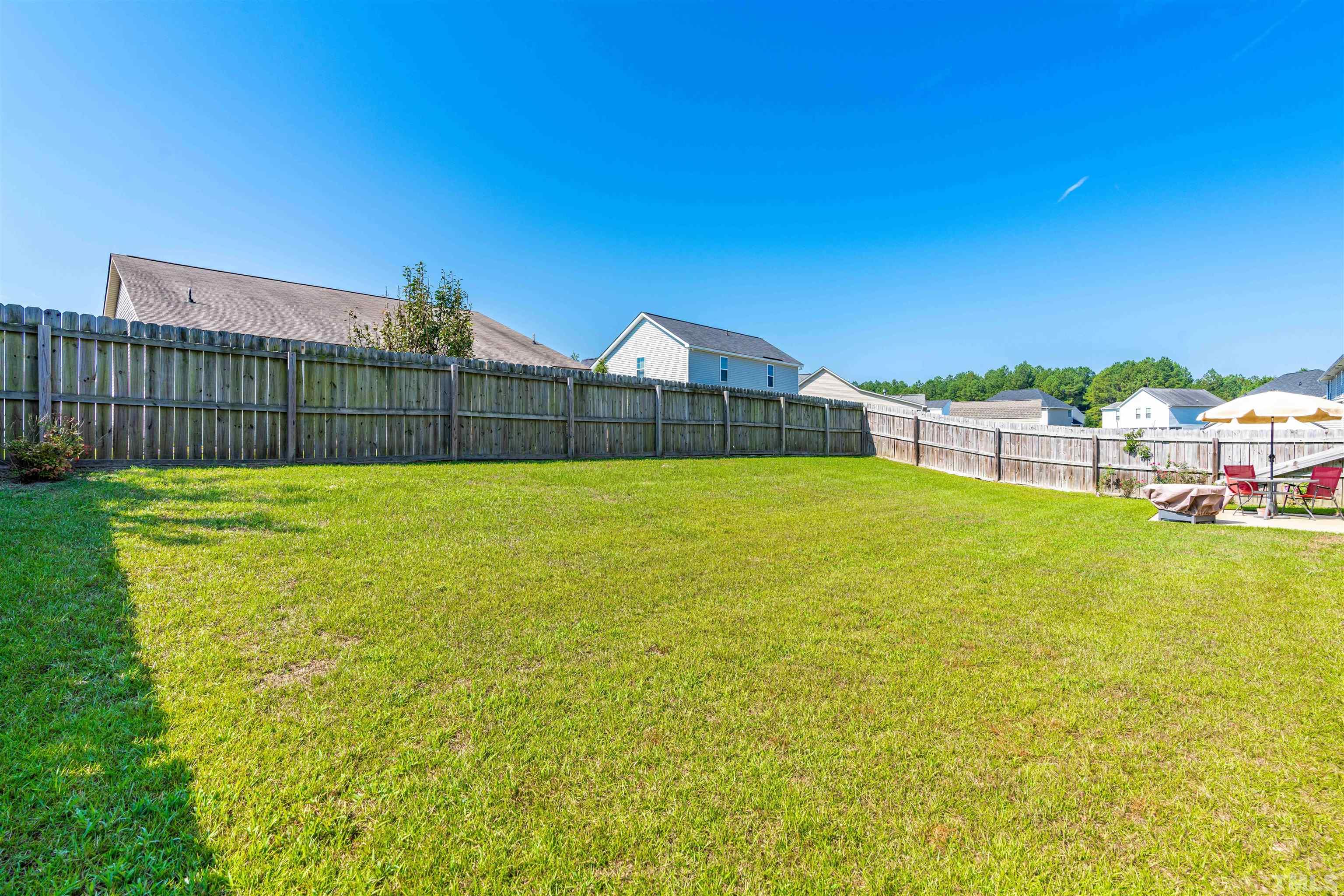 180 Crane Way Bunnlevel, NC 28323 - Photo 26 of 26 a view of a swimming pool and a yard