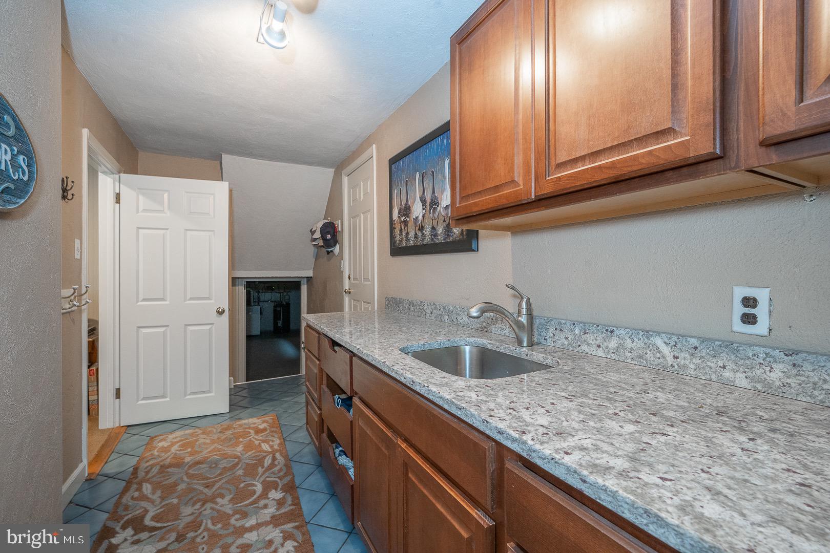 735 Hamilton Road Bryn Mawr, PA 19010 - Photo 51 of 66 Handy sink, storage and entrance to garage