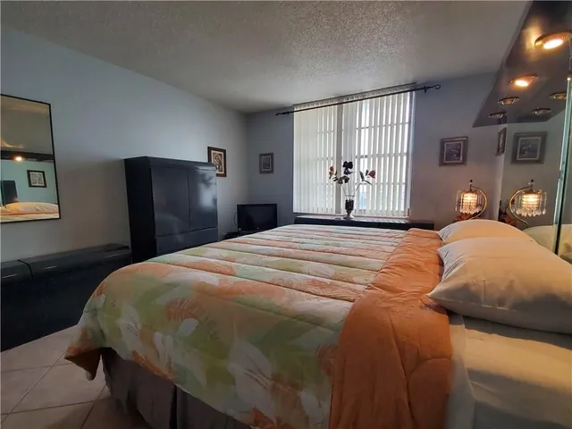 a view of a street with cars