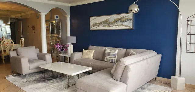 a terrace with a table and chairs