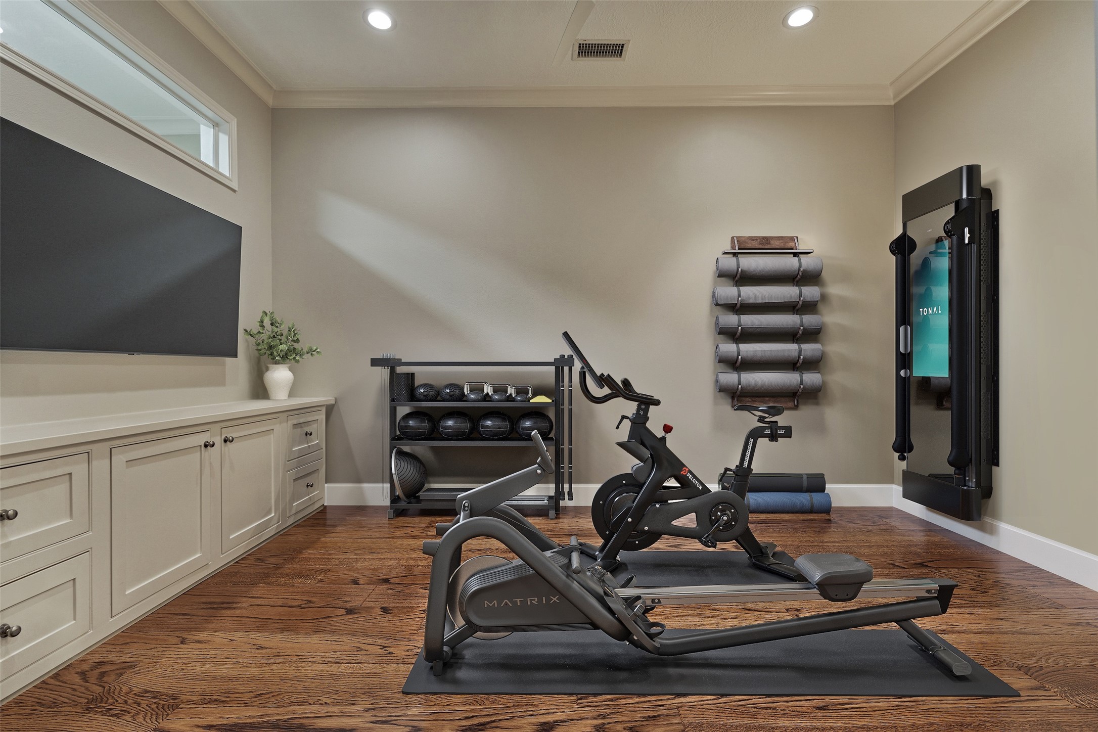 22 East Shore Drive The Woodlands, TX 77380 - Photo 38 of 50 The separate Media Room is located in the rear of the second floor and has pocket doors, custom built-ins and can also be used as an Exercise Room.