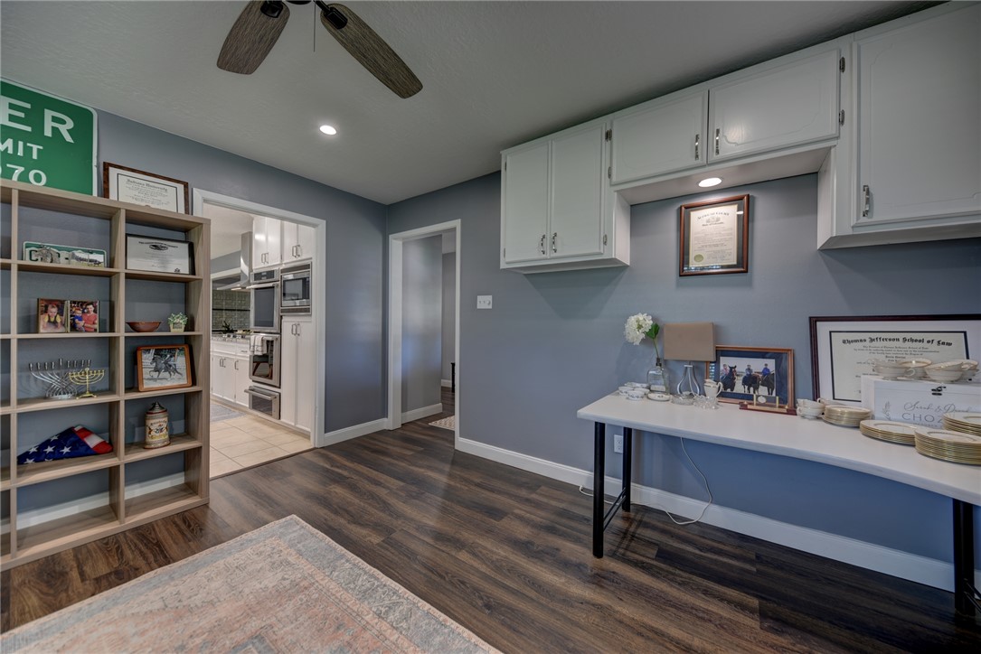 1600 Pecan Street Brenham, TX 77833 - Photo 21 of 33 Built in cabinets, ceiling fan and baseboards
