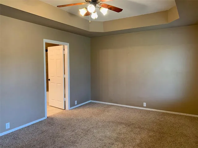 a bathroom with a sink double vanity and a mirror