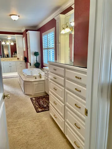 a bathroom with a sink a vanity and a mirror