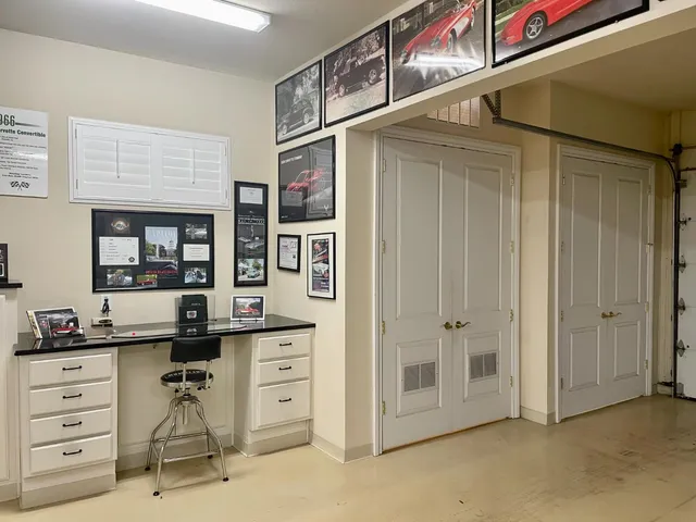 a view of a workspace with furniture