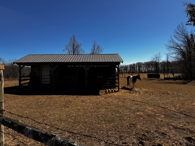 6910 Rowe Gap Road Belvidere, TN 37306 - Photo 26 of 30 a view of a house with a yard