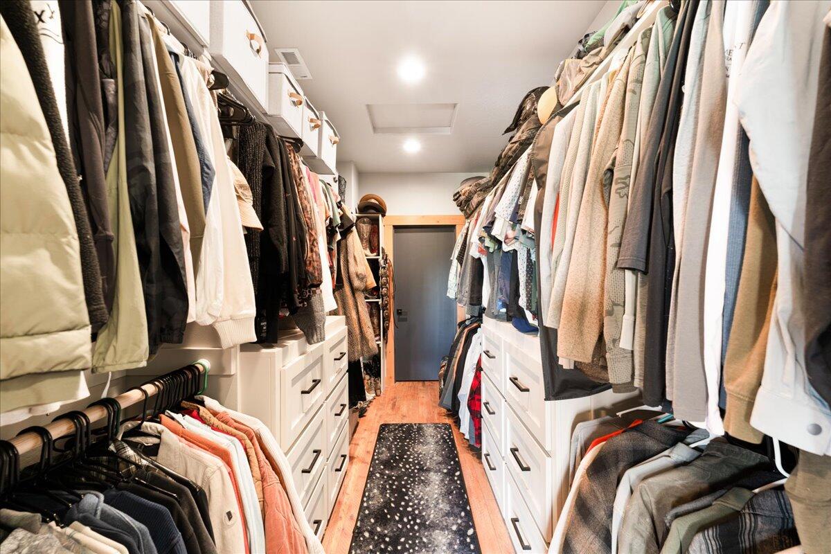 2220 Butte Falls Highway Eagle Point, OR 97524 - Photo 26 of 69 a view of walk in closet with clothes and shoes