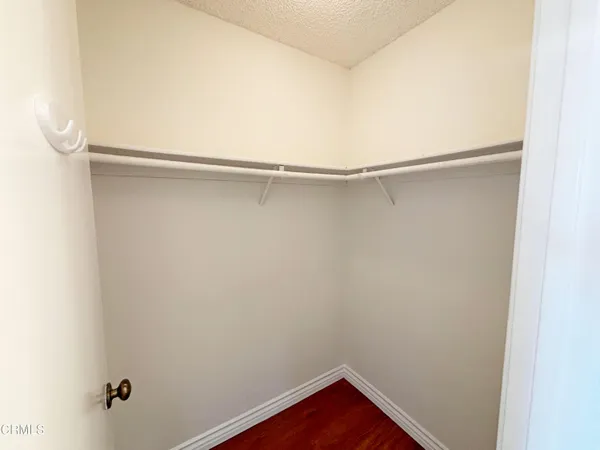 a view of a room with racks on the wall