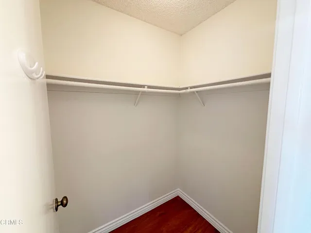 a view of a room with racks on the wall