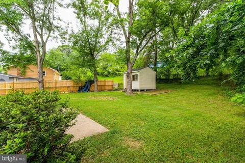 a fire hydrant in the middle of a field