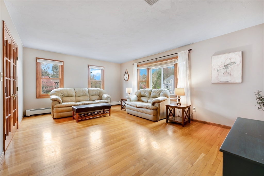 206 Olde Forge Road Hanover, MA 02339 - Photo 11 of 42 a bedroom with furniture and a couch
