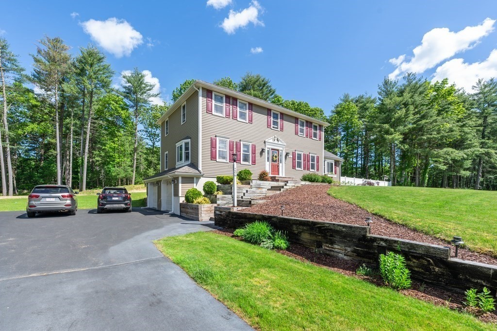 206 Olde Forge Road Hanover, MA 02339 - Photo 2 of 42 a view of a house with a back yard